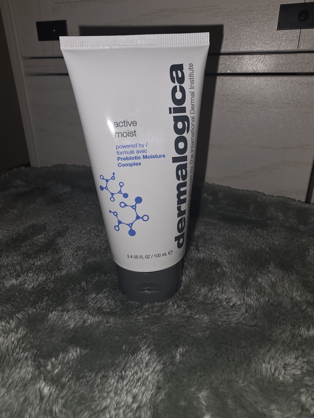 Dermalogica White Moisturizer Tube with Blue Graphic NWOB